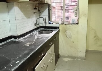 Kitchen in 1 BHK Apartment at Rosa Classique, Kasarvadavali – for Rent