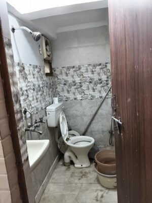 Bathroom in Studio Apartment at Dwarka – for Rent