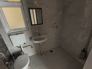 Bathroom in 2 BHK Apartment at Pivotal Riddhi Siddhi, Sector 99 – for Rent