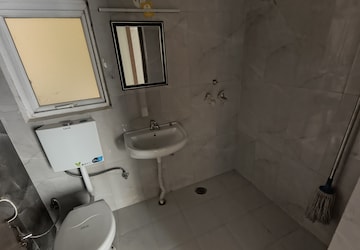 Bathroom in 2 BHK Apartment at Pivotal Riddhi Siddhi, Sector 99 – for Rent