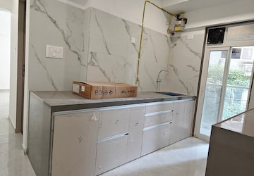 Kitchen in 2 BHK Apartment at Juhu Gulmohar CHS, Vile Parle West – for Rent