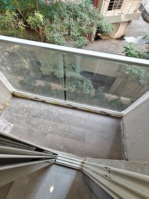 Balcony in 2 BHK Apartment at Juhu Gulmohar CHS, Vile Parle West – for Rent