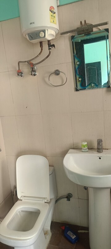 Bathroom in 3 BHK Apartment at Aims Golf Avenue II, Sector 75 – for Rent