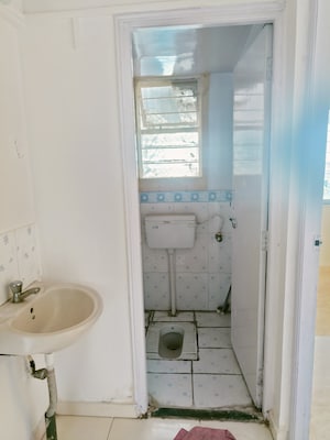 Bathroom in 2 BHK Apartment at Wadgaon Sheri – for Rent