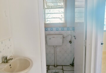 Bathroom in 2 BHK Apartment at Wadgaon Sheri – for Rent