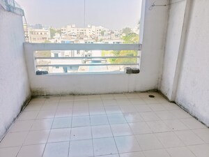 Balcony in 2 BHK Apartment at Wadgaon Sheri – for Rent