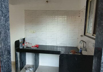 Kitchen in 2 BHK Apartment at Wadgaon Sheri – for Rent