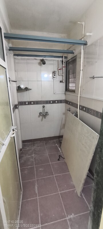 Bathroom in 2 BHK Apartment at Yashraj Park CHS, Kasarvadavali – for Rent