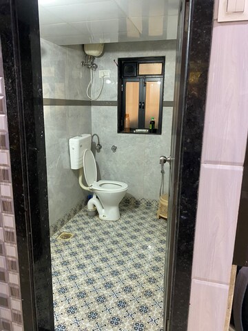 Bathroom in 2 BHK Apartment at Gala Pride Park, Manpada – for Rent