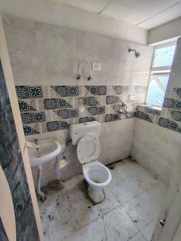 Bathroom in 3 BHK Apartment at Signature Global Golf Greens, Sector 79 – for Rent