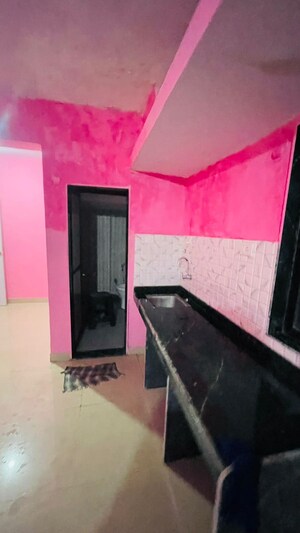 Kitchen in 2 BHK Apartment at Yashraj Park CHS, Kasarvadavali – for Rent