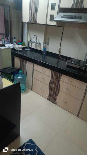Kitchen in 2 BHK Apartment at Renaissance Tower, Andheri West – for Rent