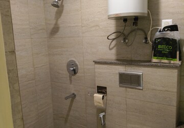 Bathroom in 2 BHK Apartment at Shapoorji Pallonji Joyville Phase 2, Sector 102 – for Rent