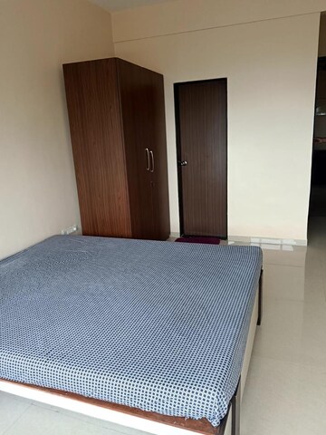 Bedroom in 2 BHK Apartment at Benzer Tower, Kandivali East – for Sale
