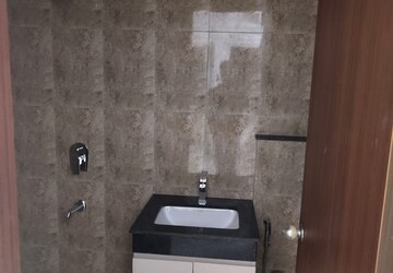 Bathroom in 2 BHK Apartment at Shapoorji Pallonji Joyville Gurgaon, Sector 102 – for Rent