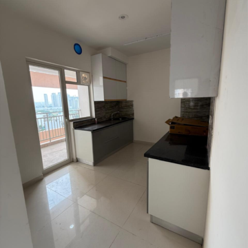 Kitchen in 3 BHK Apartment at Shapoorji Pallonji Joyville Tower Crown, Sector 102 – for Rent