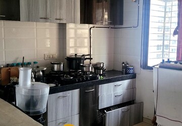 Kitchen in 2 BHK Apartment at Indu Ganesh CHS, Sion – for Sale