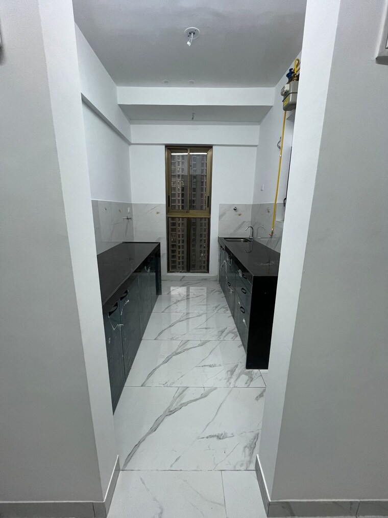 Kitchen, raymond-ten-x-habitat 2 Bedroom 644 Sq.Ft. Apartment In Pokhran Road No Two Thane 9346850