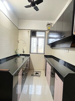 Kitchen in 2 BHK Apartment at Cosmos Classique, Brahmand – for Rent