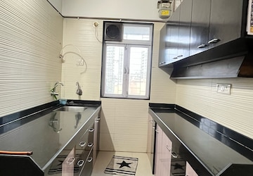 Kitchen in 2 BHK Apartment at Cosmos Classique, Brahmand – for Rent