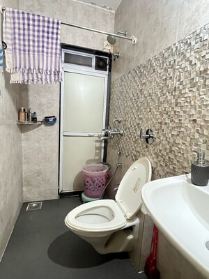 Bathroom in 2 BHK Apartment at Cosmos Classique, Brahmand – for Rent