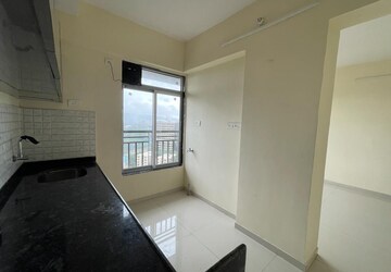 Kitchen in 2 BHK Apartment at Indu Ganesh CHS, Sion – for Sale