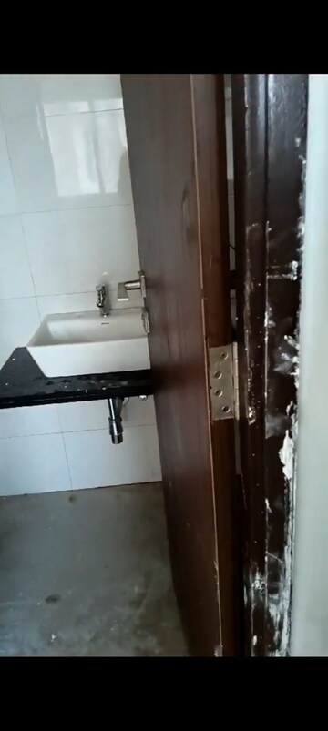 Bathroom in 1 BHK Apartment at Omkar Signet, Malad East – for Rent