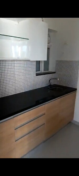 Kitchen in 1 BHK Apartment at Omkar Signet, Malad East – for Rent