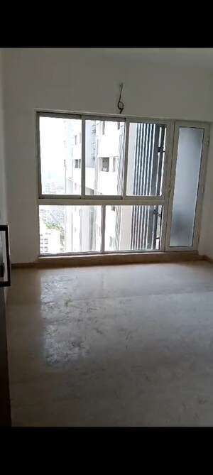 Room in 1 BHK Apartment at Omkar Signet, Malad East – for Rent