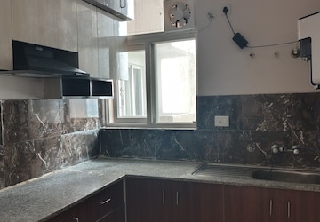 Kitchen in 3 BHK Apartment at Amrapali Riverview, Amrapali Leisure Valley – for Rent
