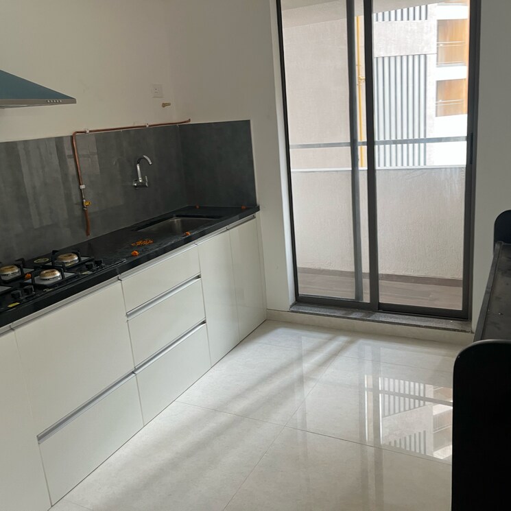 Kitchen, pride-world-city-wellington 3 Bedroom 1056 Sq.Ft. Apartment In Madhav Nagar Pune 9347146