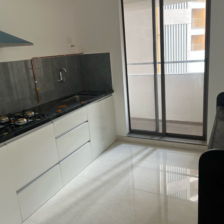 Kitchen, pride-world-city-wellington 3 Bedroom 1056 Sq.Ft. Apartment In Madhav Nagar Pune 9347146