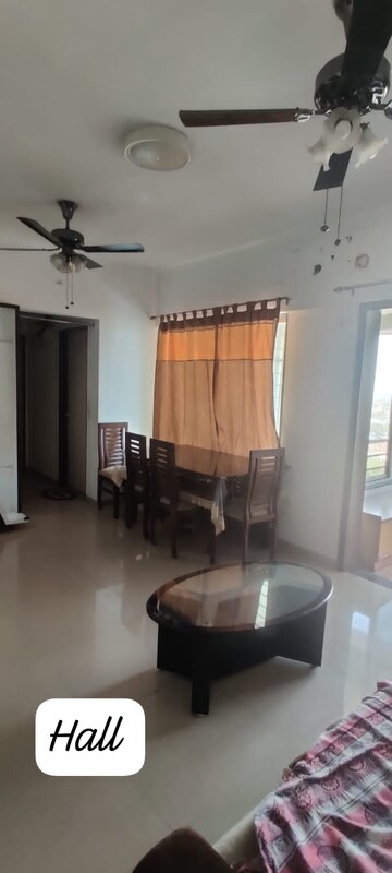 Living Room in 1 BHK Apartment at Raj Heramba Venkatesh Imperia, Tathawade – for Rent