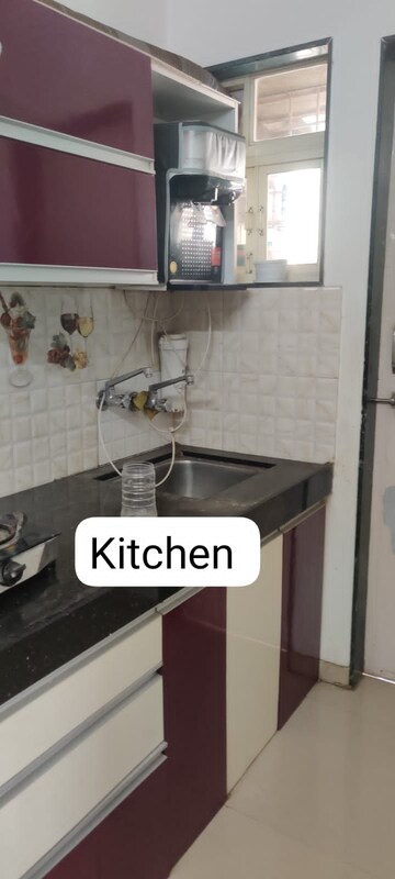 Kitchen in 1 BHK Apartment at Raj Heramba Venkatesh Imperia, Tathawade – for Rent