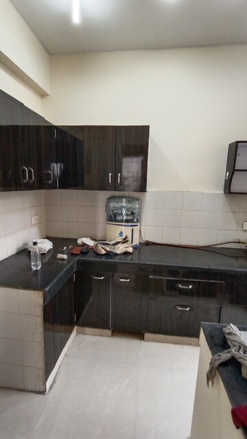 Kitchen in 2 BHK Apartment at Aditya Urban Casa, Sector 78 – for Rent