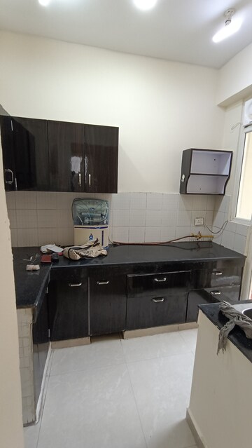 Kitchen in 2 BHK Apartment at Aditya Urban Casa, Sector 78 – for Rent