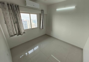 Room in 2 BHK Apartment at Omkar Signet, Malad East – for Rent