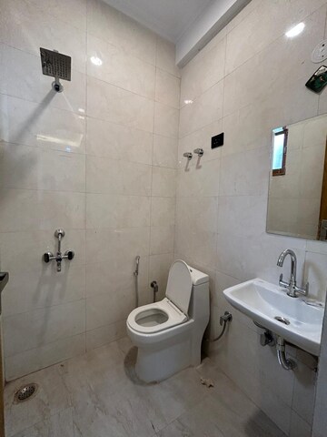 Bathroom in 1 BHK Builder Floor at Freedom Fighters Enclave – for Rent