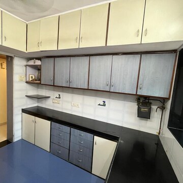 Kitchen in 2 BHK Apartment at Krishna Apartment Santacruz West, Navin Nagar – for Sale