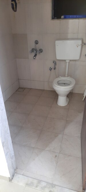 Bathroom in 1 BHK Apartment at Ram Pushpanjali Residency, Owale – for Sale