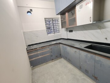 Kitchen in 1 BHK Apartment at Reliable Lake Dew Residency, Haralur Road – for Rent