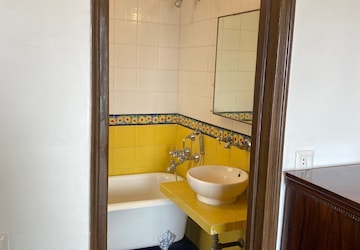 Bathroom in 3 BHK Apartment at Shivalaya CHS Worli, Upper Worli – for Rent