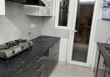Kitchen in 2 BHK Apartment at NK Sharma Savitry Greens, Lohgarh – for Rent