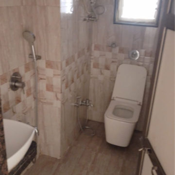 Bathroom in 2 BHK Apartment at Santacruz Triveni CHS, Santacruz West – for Sale