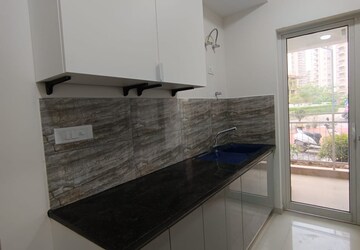 Kitchen in 2 BHK Apartment at Pivotal Riddhi Siddhi, Sector 99 – for Rent