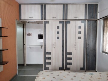 Bedroom in 2 BHK Apartment at Samruddhi Apartments, Camp – for Rent