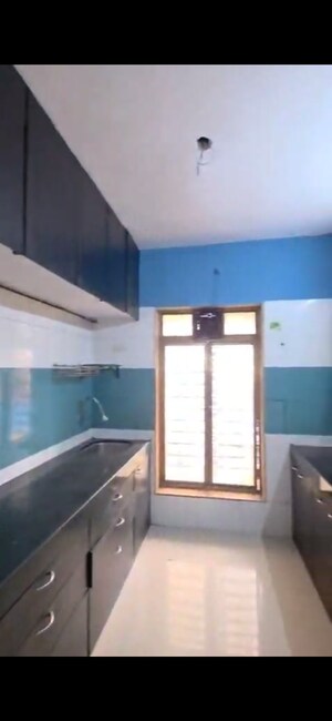 Kitchen in 2 BHK Apartment at Ravi Groups Gaurav Excellency, Mira Road – for Rent