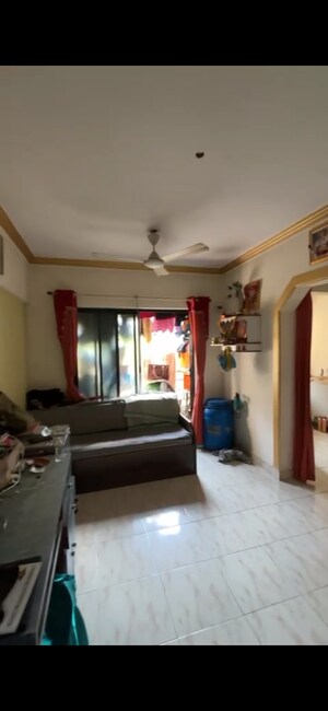 Living Room in 1 BHK Apartment at New Om Complex CHSL, Mira Road – for Rent