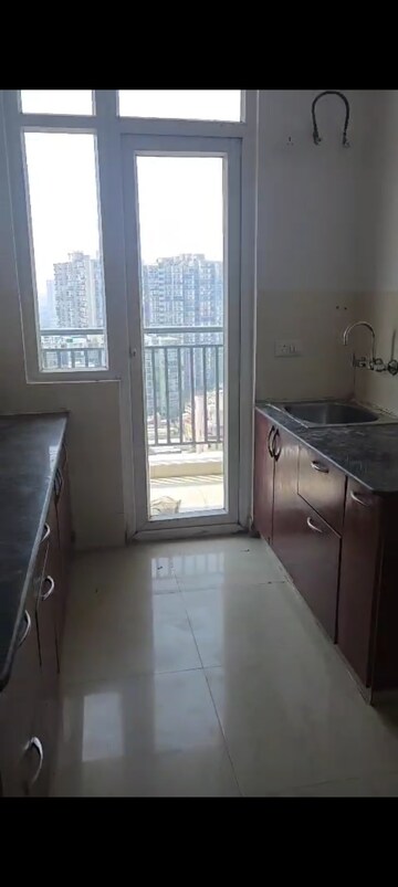 Kitchen in 3 BHK Apartment at Ashiana Palm Court, Raj Nagar Extension – for Sale
