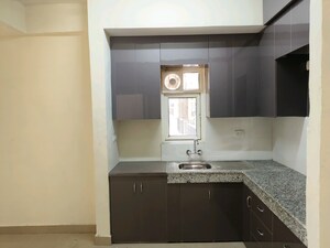 Kitchen in 4 BHK Apartment at Antriksh Central Avenue, Sector 33 – for Sale